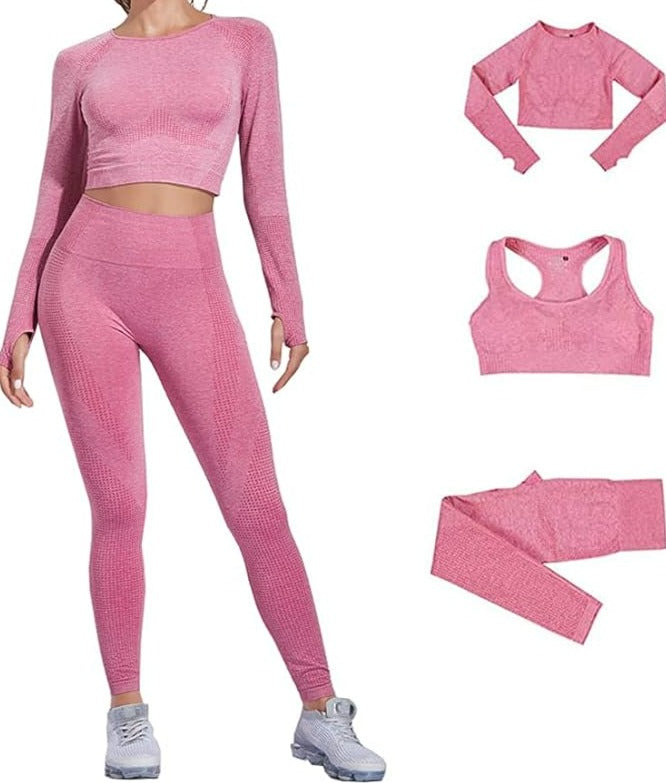Laad afbeelding in Galerijviewer, De &quot;Zie er geweldig uit en voel je geweldig in deze 3-delige yoga workoutset!&quot; bestaat uit een roze crop-top met lange mouwen, sport-bh en een legging van vaste stof. Het ontwerp met hoge taille is chic met witte sneakers, perfect voor individuele of gecombineerde slijtage.
