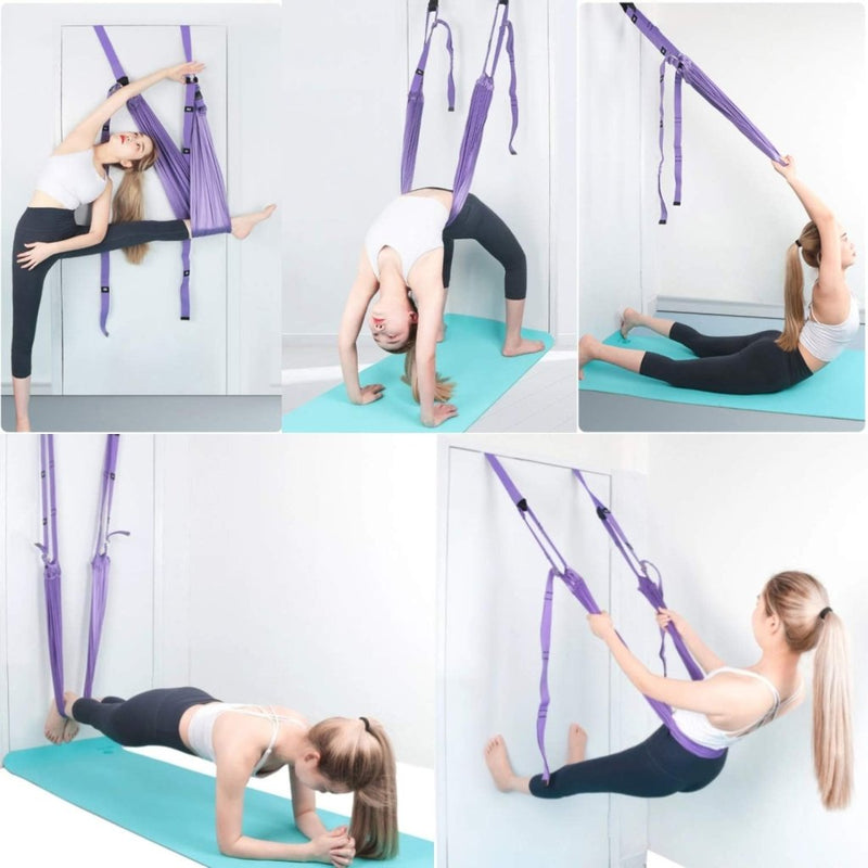 Laad afbeelding in Galerijviewer, Een vrouw voert op elegante wijze aerial yoga poses uit met behulp van de &quot;Verbeter je flexibiliteit met de beste yogariem.&quot; De paarse banden en turquoise mat tegen een witte muur in een lichte kamer benadrukken haar focus op veelzijdigheid en het verbeteren van haar beoefening.
