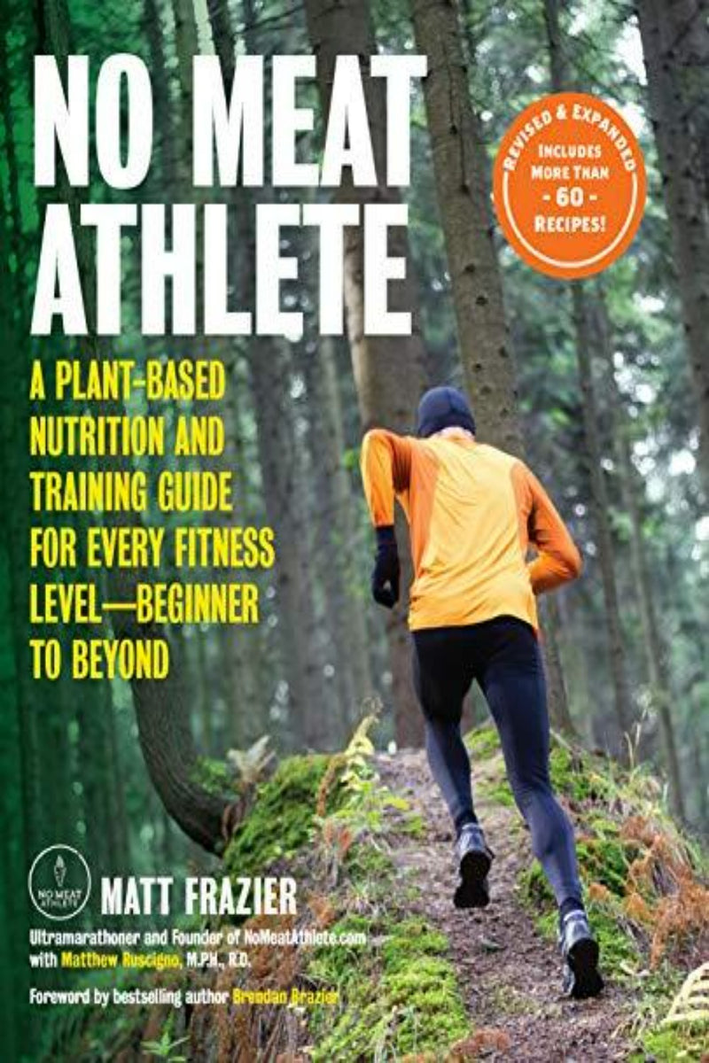 Laad afbeelding in Galerijviewer, De cover van &quot;Frazier, M: No Meat Athlete, Revised and Expanded&quot; toont een persoon die aan het joggen is op een bospad. Deze op planten gebaseerde gids biedt voedings- en trainingsadviezen voor elk fitnessniveau en bevat meer dan 60 recepten.
