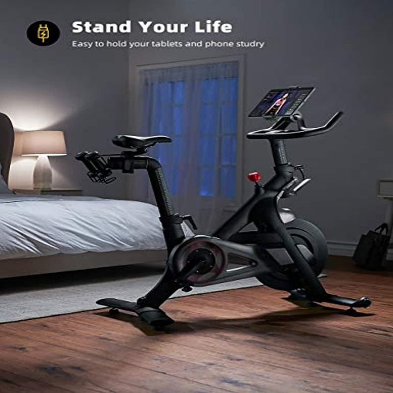 Laad afbeelding in Galerijviewer, In een kamer met weinig licht plaatst u de Loopband en hometrainer tablethouder naast het bed. Zo kunt u uw tablet en telefoon eenvoudig bedienen en handsfree genieten.
