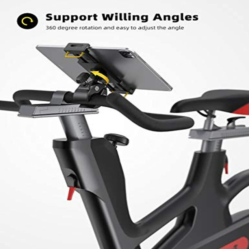 Laad afbeelding in Galerijviewer, Het stuur van de hometrainer is uitgerust met de &quot;Loopband en hometrainer tablethouder: De ultieme manier om te trainen en te genieten&quot;, met 360 graden rotatie en een instelbare hoekschaal voor brede apparaatcompatibiliteit en handsfree entertainment.
