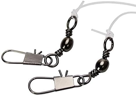 Laad afbeelding in Galerijviewer, Twee lichtgevende visserij-rigs met draaibare snaps, kleine metalen kralen en transparante monofilament lijnen zijn voorzien van koolstofhaken voor extra stevigheid, zodat u meer vis kunt vangen in het donker.
