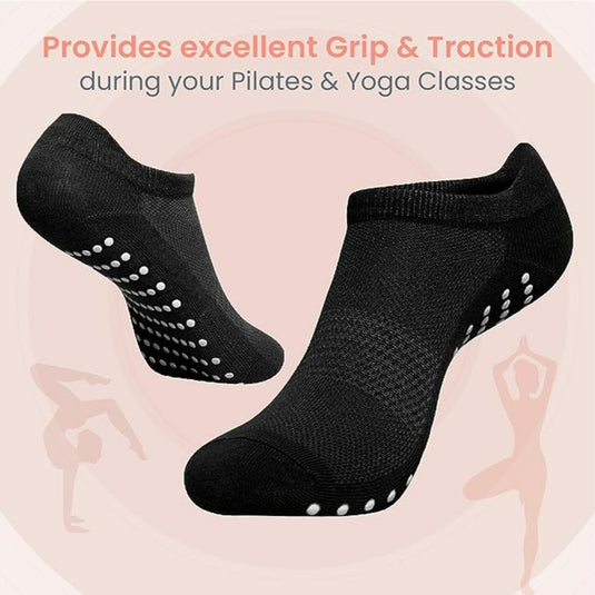 Zwarte full-toe yoga sokken met witte grip dots bieden effectieve grip en tractie voor yoga en Pilates. Silhouetten laten divers gebruik in lessen zien, met nadruk op de Full toe yoga sokken: de ultieme grip en comfort voor elke yogapose.